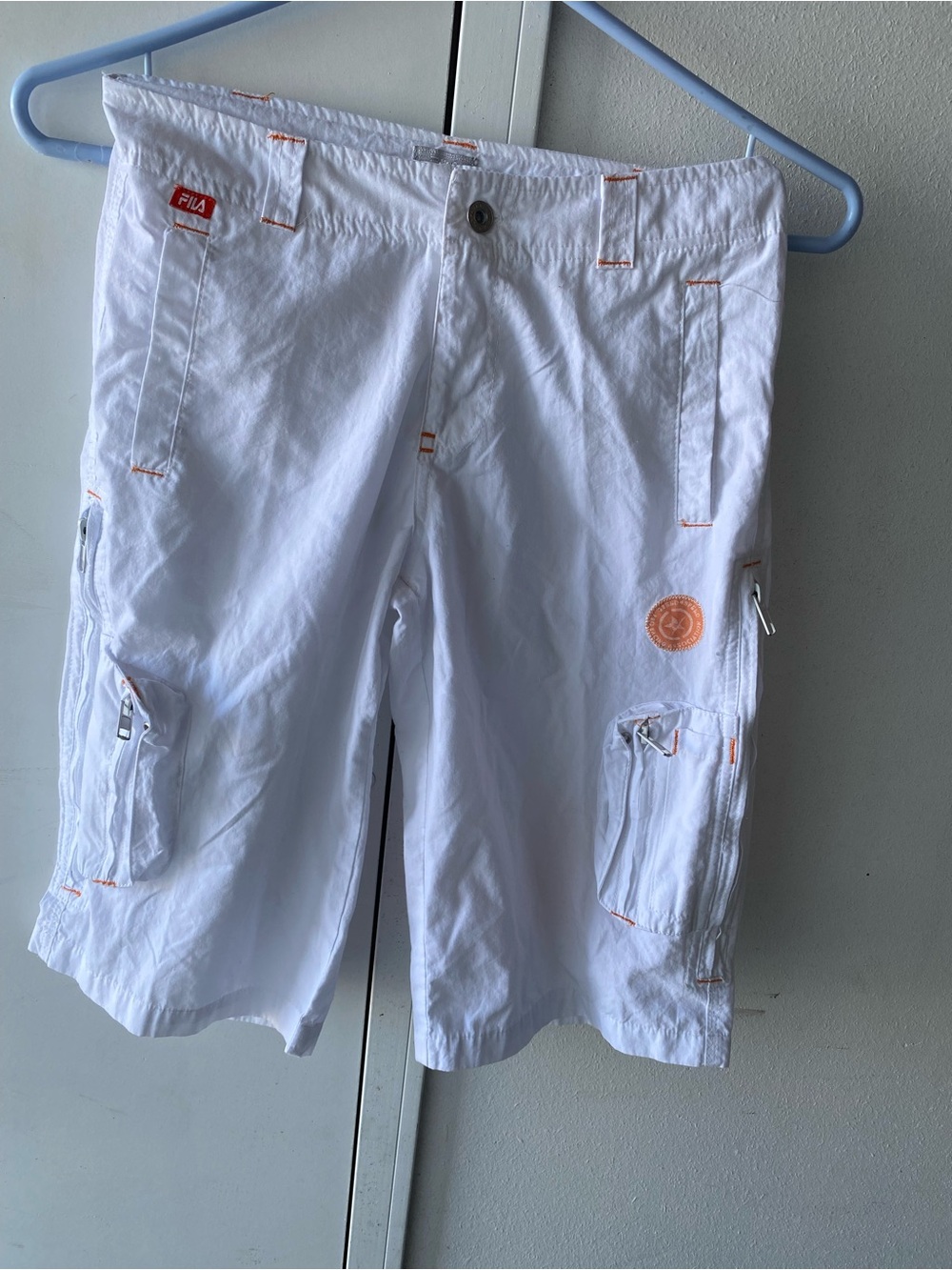White Fila cargo shorts in size juniors size 12.
